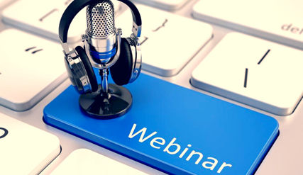 Keyboard with a blue Webinar button